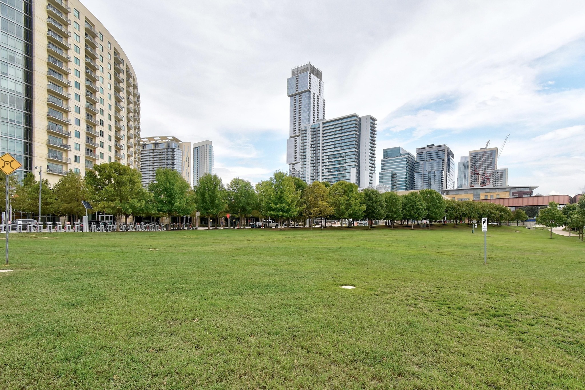 300 Bowie Street, Unit 2902 Austin, TX 78703 - Photo 32 of 40 a view of a city with tall buildings and a big yard