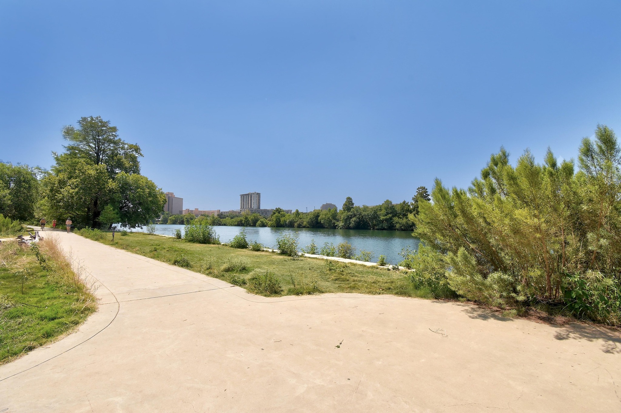 300 Bowie Street, Unit 2902 Austin, TX 78703 - Photo 34 of 40 a view of a lake from a yard