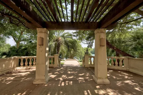 a view of backyard with sitting area