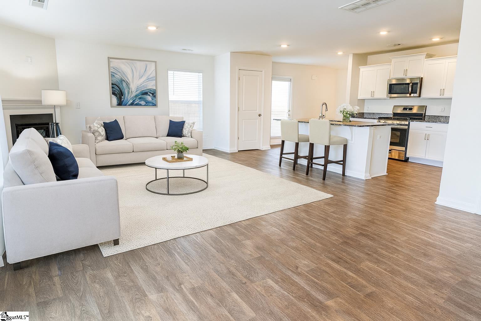 1348 Ledsham Court Greer, SC 29651 - Photo 3 of 34 Living room and kitchen