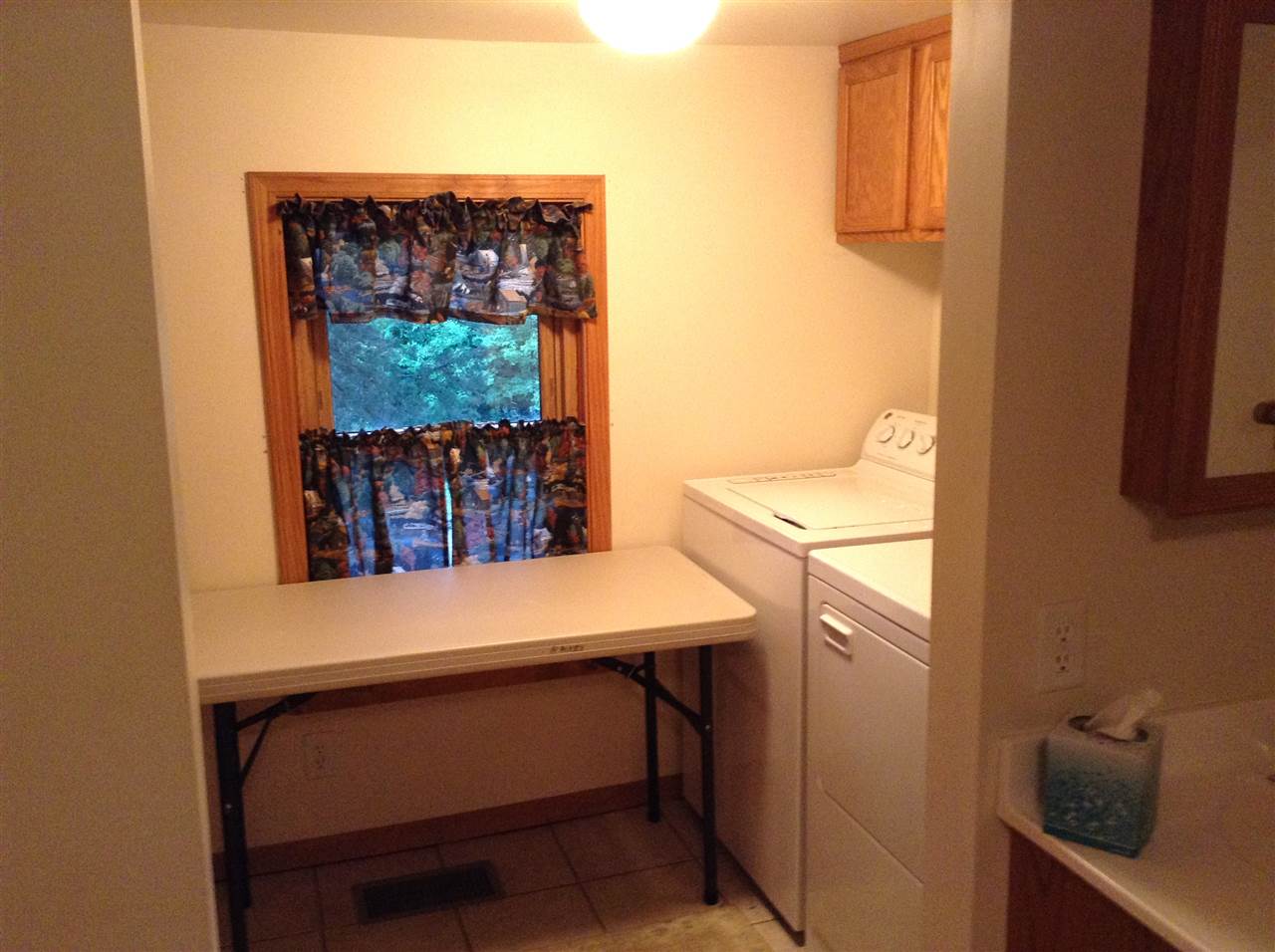 1101 East Spring Creek Road Oregon, IL 61061 - Photo 13 of 22 a view of a bedroom with a table and chairs
