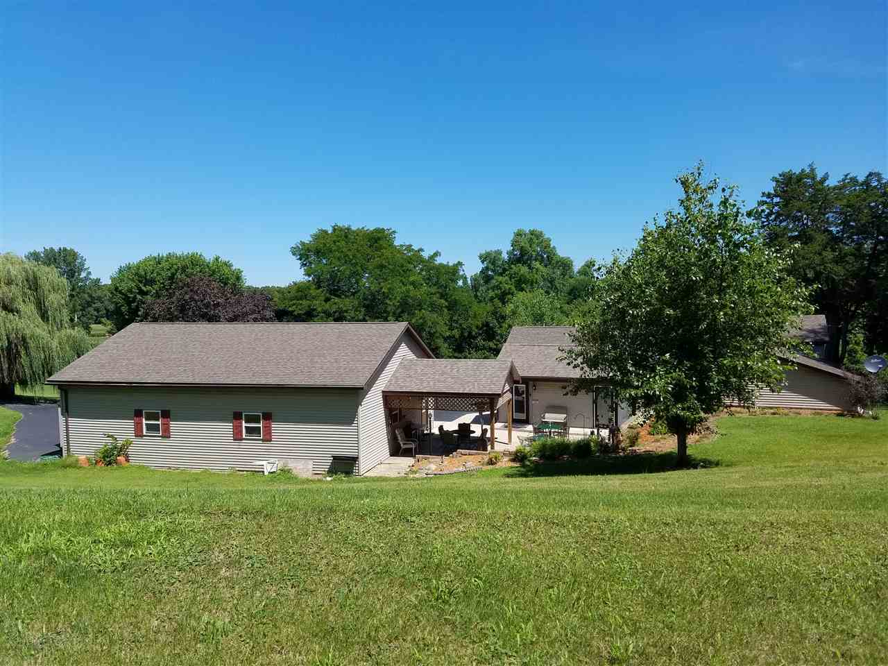 1101 East Spring Creek Road Oregon, IL 61061 - Photo 21 of 22 a view of house and outdoor space