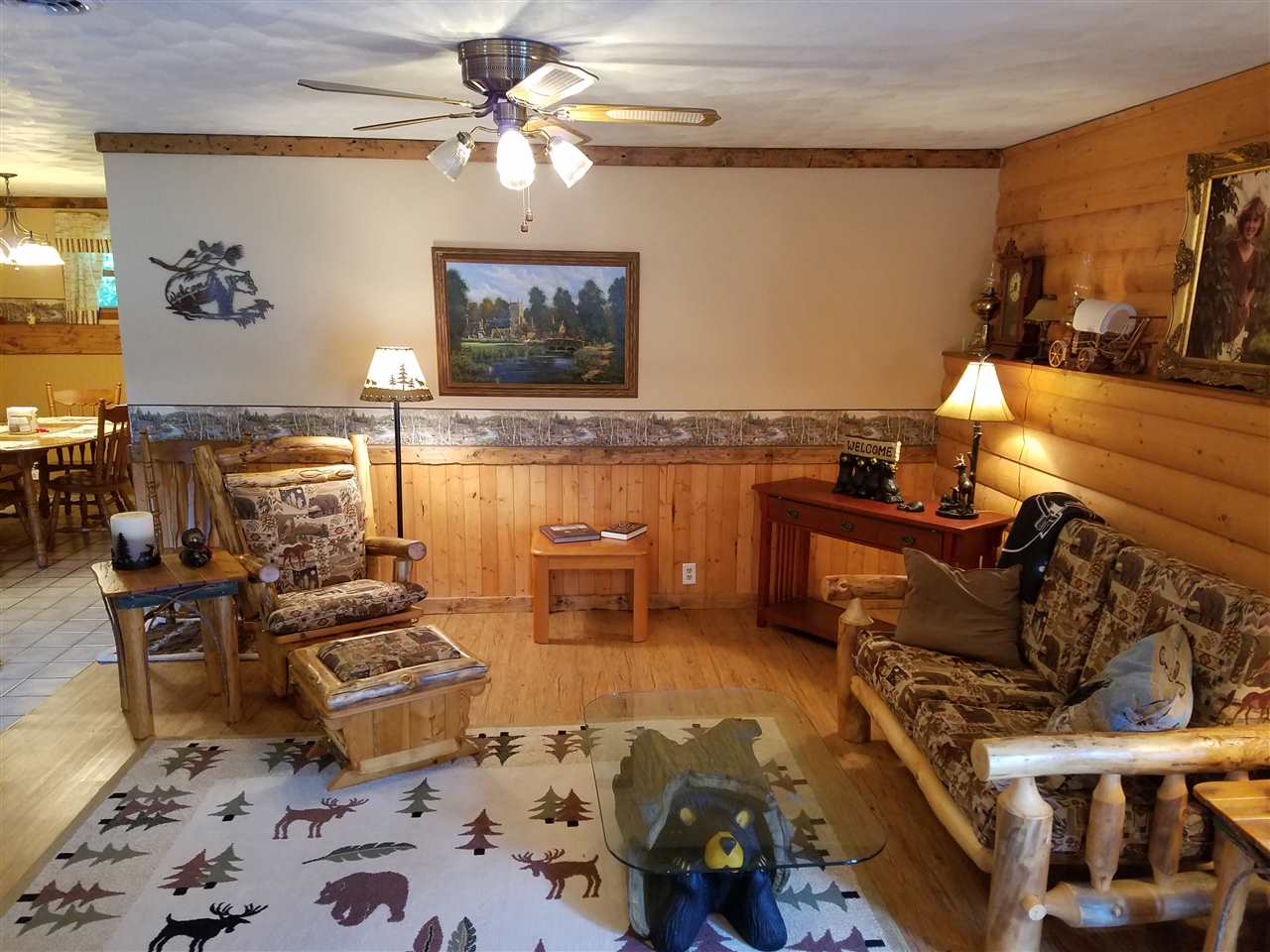 1101 East Spring Creek Road Oregon, IL 61061 - Photo 8 of 22 a living room with furniture and a flat screen tv