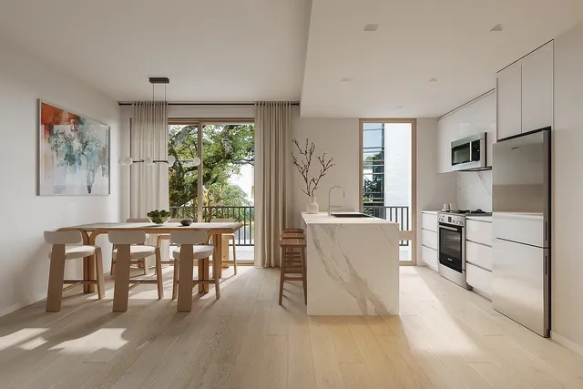 a living room with furniture a dining table and a large window