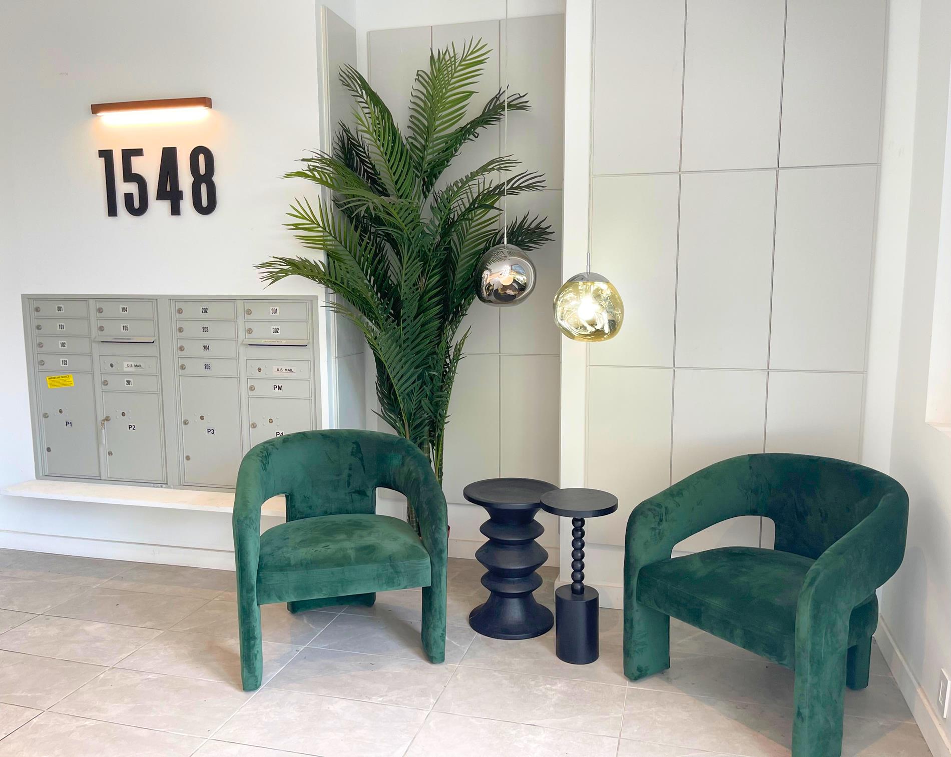 1548 72nd Street, Unit 302 Brooklyn, NY 11228 - Photo 3 of 12 a living room with furniture and a potted plant