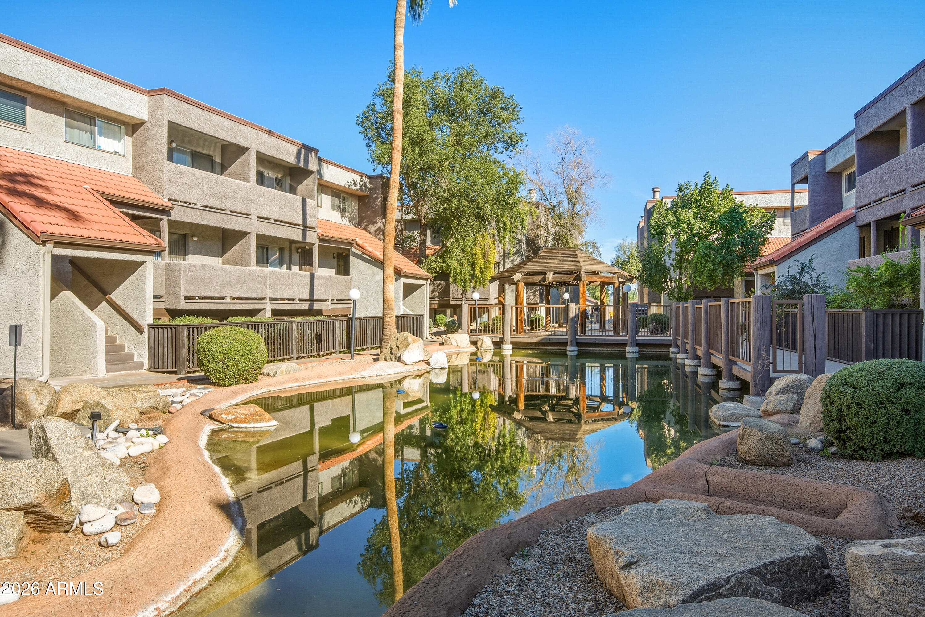1645 West Baseline Road, Unit 2002 Mesa, AZ 85202 - Photo 1 of 21 a front view of a building with balcony