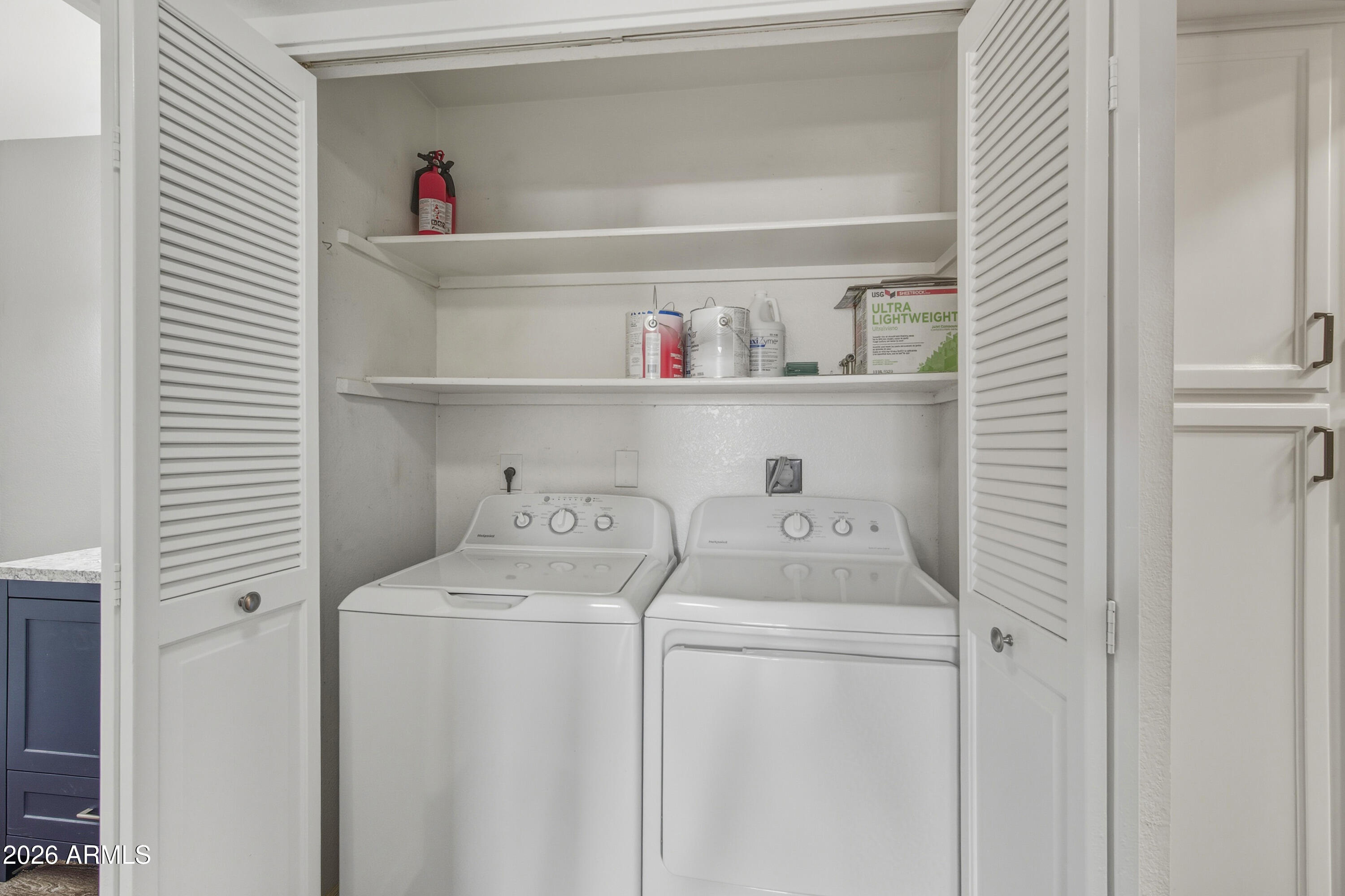 1645 West Baseline Road, Unit 2002 Mesa, AZ 85202 - Photo 14 of 21 a utility room with dryer and washer