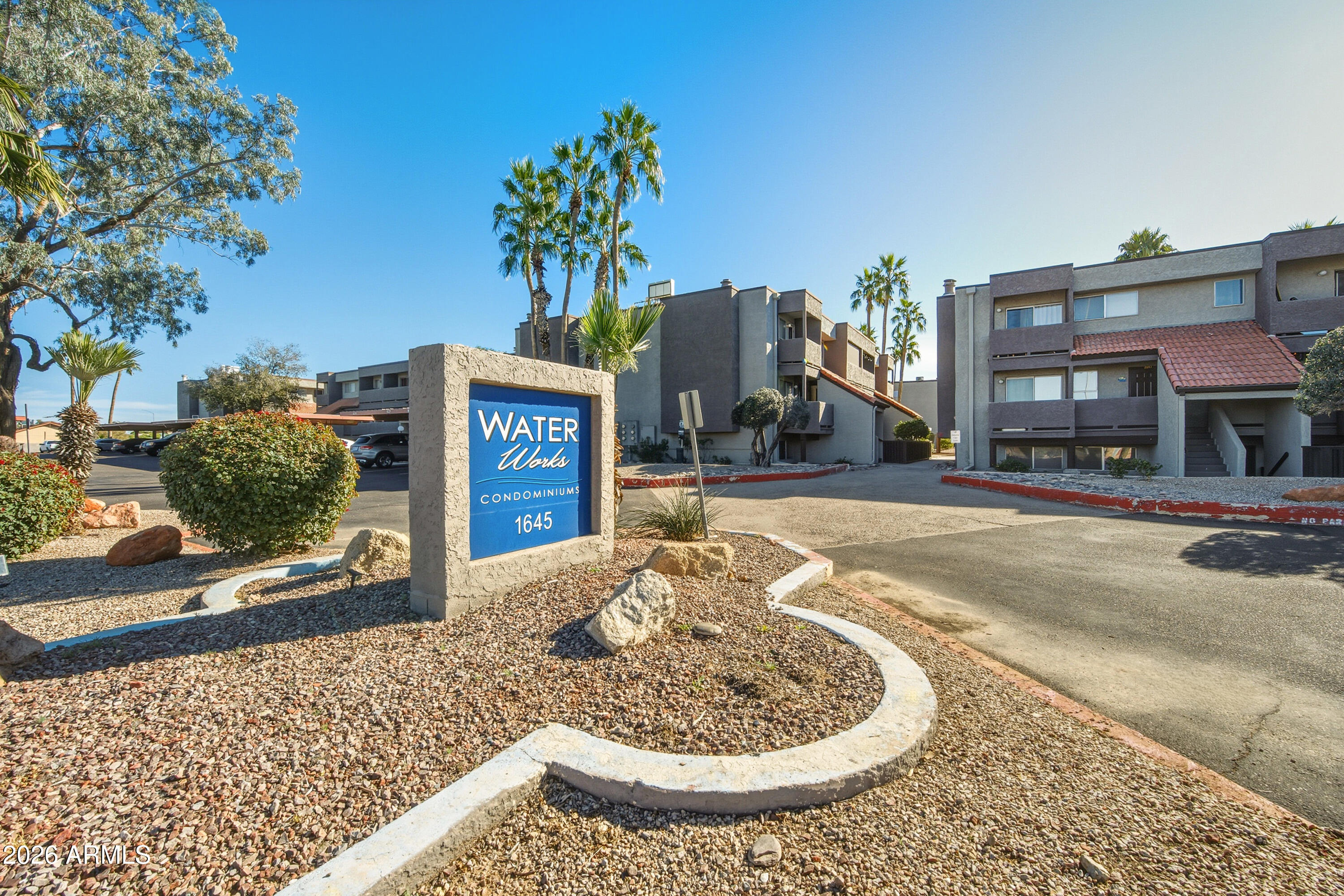 1645 West Baseline Road, Unit 2002 Mesa, AZ 85202 - Photo 18 of 21 a view of a house with basketball court