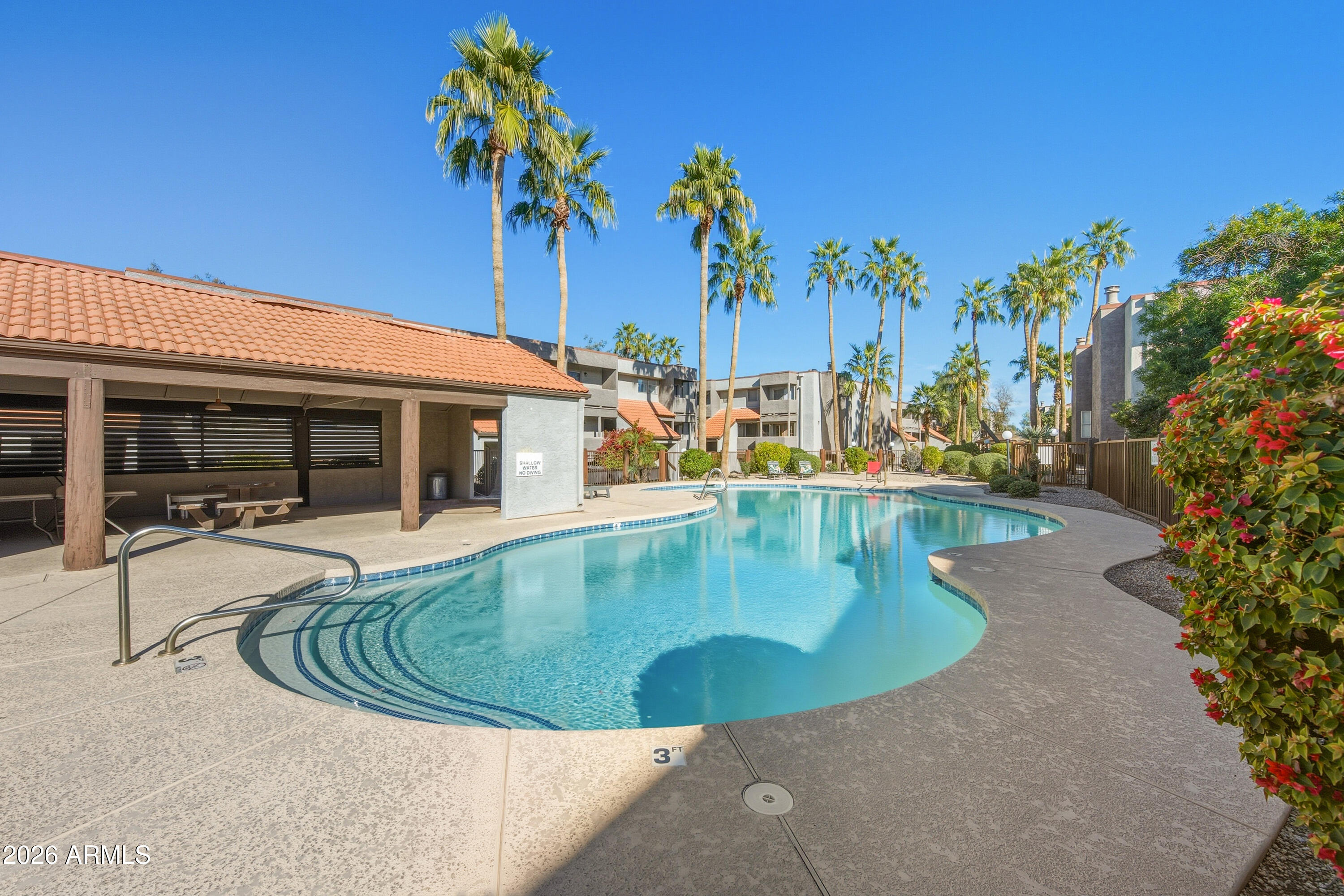 1645 West Baseline Road, Unit 2002 Mesa, AZ 85202 - Photo 19 of 21 a view of a house with swimming pool