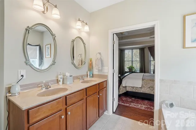 a bathroom with a bathtub and a window