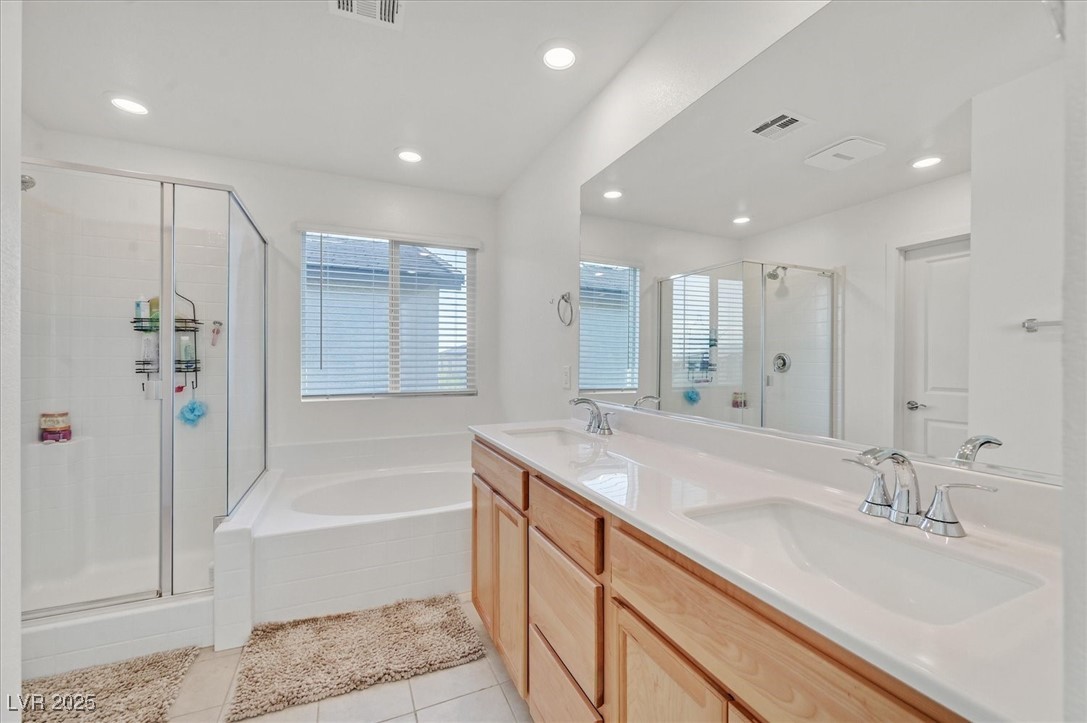 2885 Timber Country Road North Las Vegas, NV 89086 - Photo 18 of 26 Full bath featuring a sink, a stall shower, and visible vents