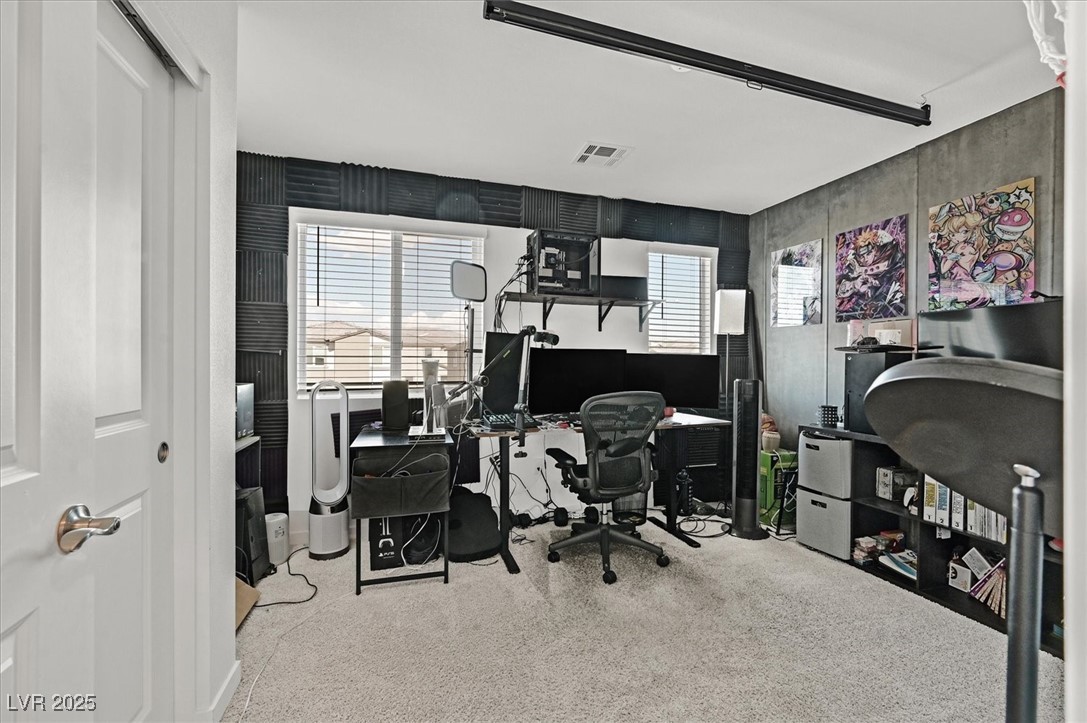2885 Timber Country Road North Las Vegas, NV 89086 - Photo 22 of 26 Home office with carpet flooring and visible vents