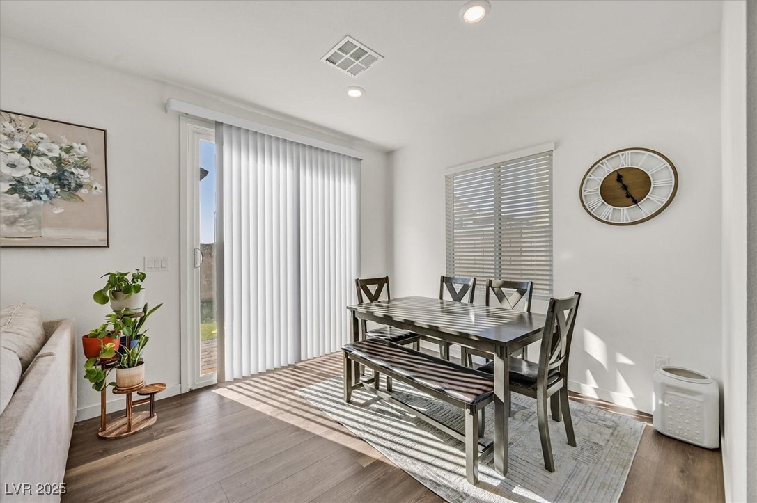 2885 Timber Country Road North Las Vegas, NV 89086 - Photo 6 of 26 Dining area featuring recessed lighting, visible vents, wood finished floors, and baseboards