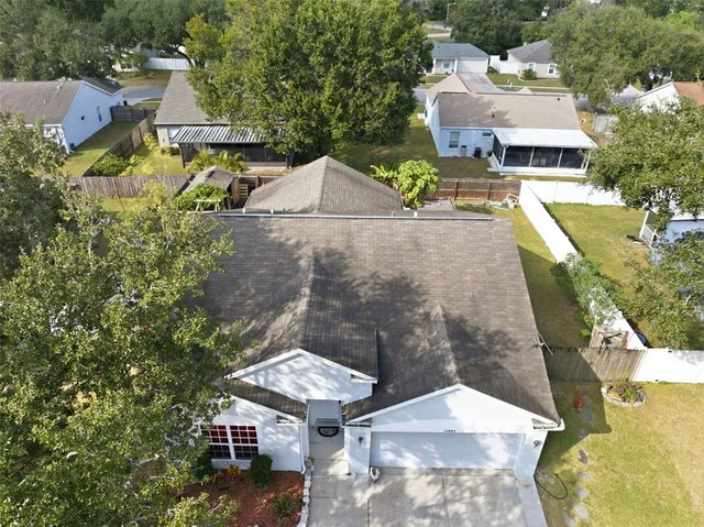 a kitchen with stainless steel appliances granite countertop a stove sink and cabinets
