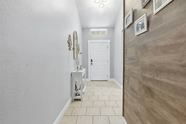 a house with swimming pool in front of it