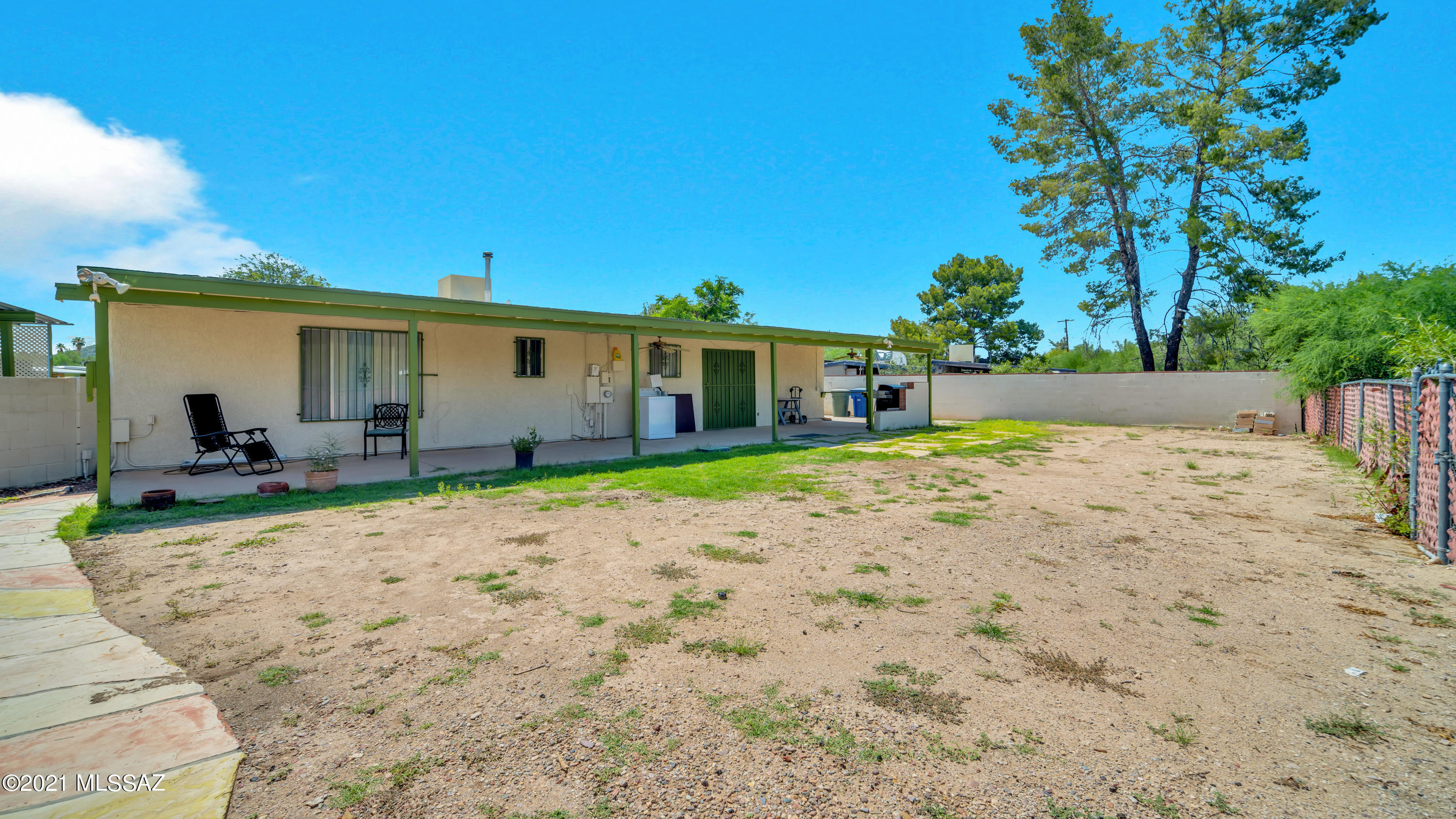 1850 West Saxony Road Tucson, AZ 85713 - Photo 25 of 33 a view of a house with backyard and sitting area