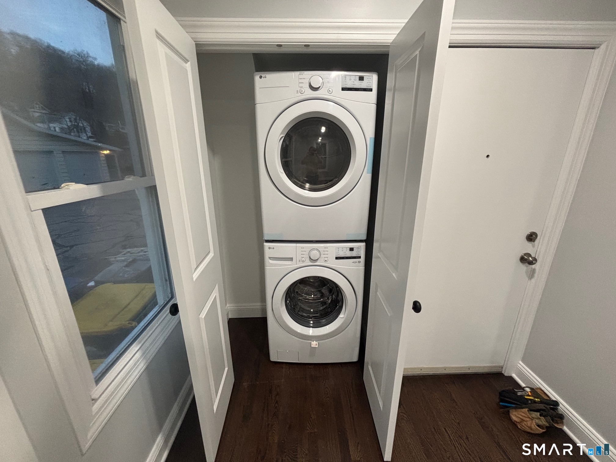 9 Clark Street Ansonia, CT 06401 - Photo 2 of 9 a utility room with dryer and washer
