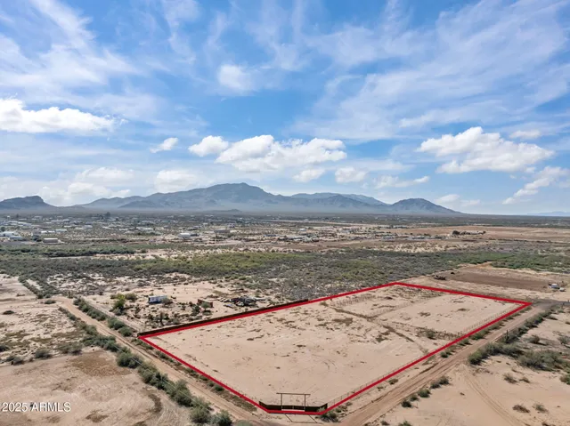 an aerial view of beach and ocean