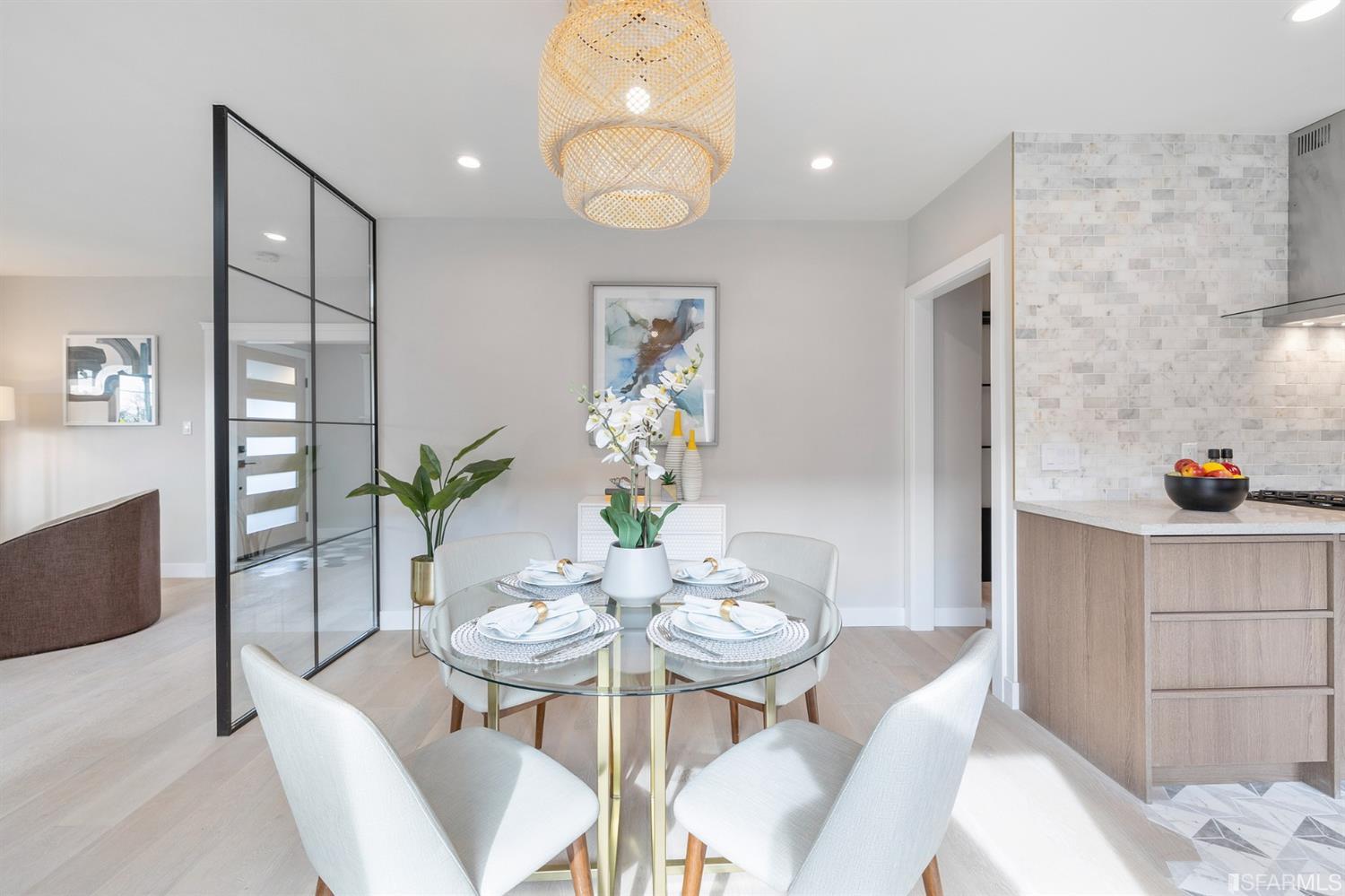 2935 Acton Street Berkeley, CA 94702 - Photo 11 of 63 a view of a dining room with furniture a potted plant and wooden floor