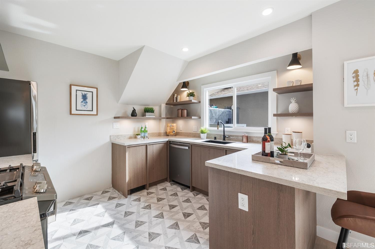 2935 Acton Street Berkeley, CA 94702 - Photo 15 of 63 a kitchen with a sink appliances and cabinets
