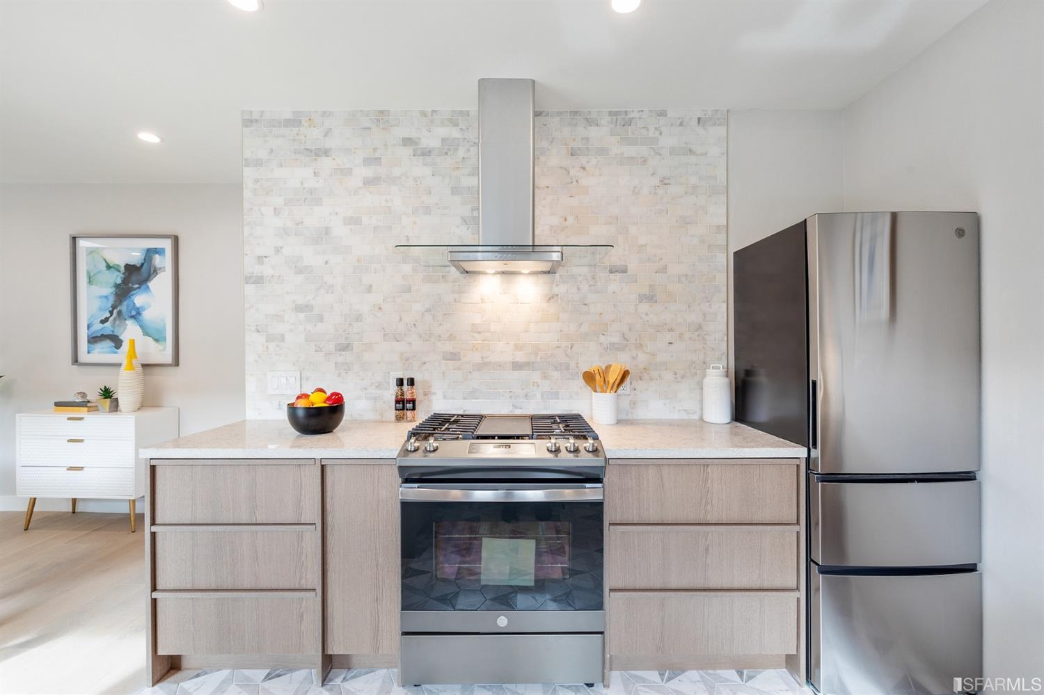 2935 Acton Street Berkeley, CA 94702 - Photo 18 of 63 a kitchen with stainless steel appliances a refrigerator and a stove top oven