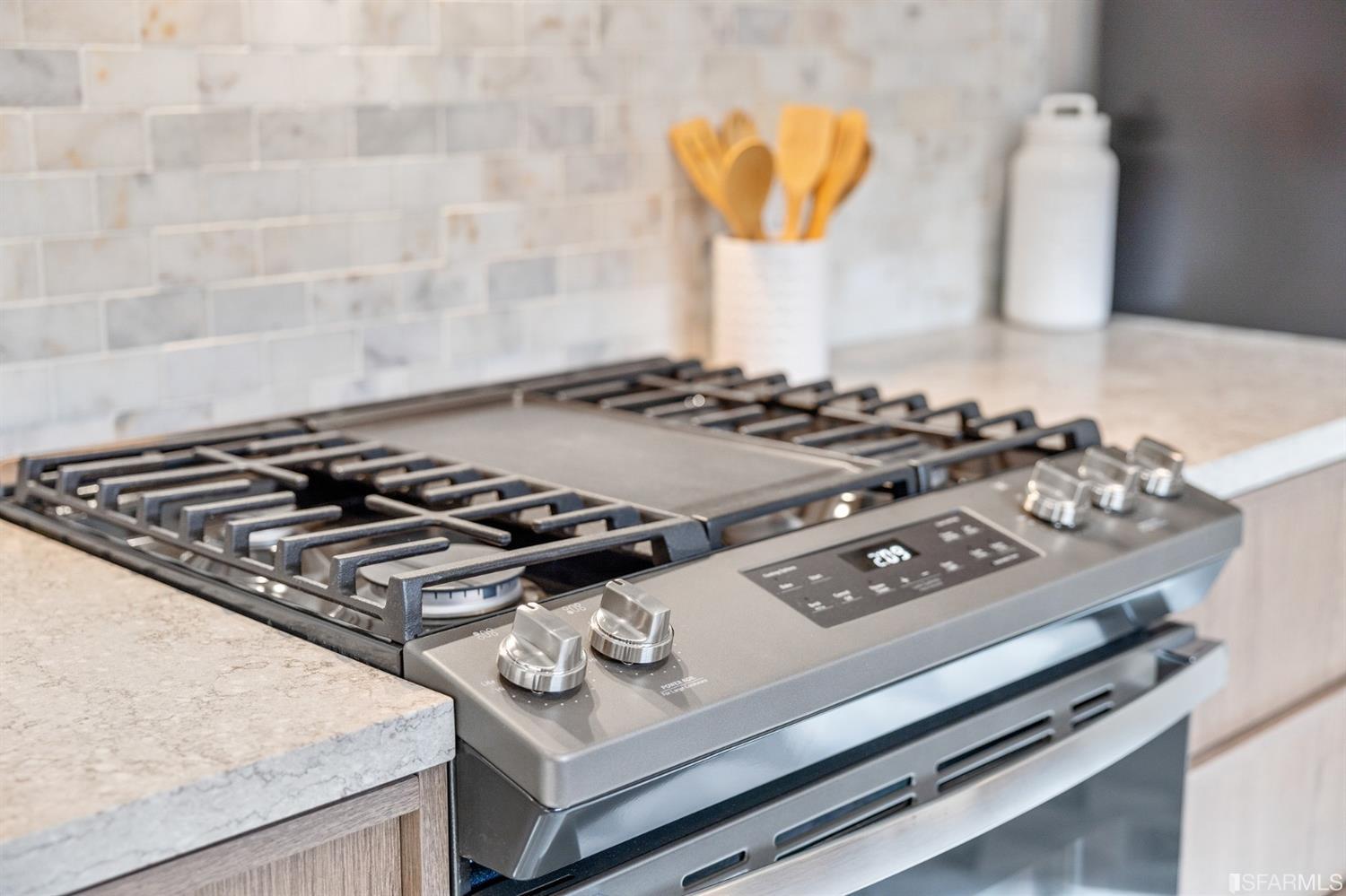 2935 Acton Street Berkeley, CA 94702 - Photo 19 of 63 a white stove top oven sitting inside of a kitchen