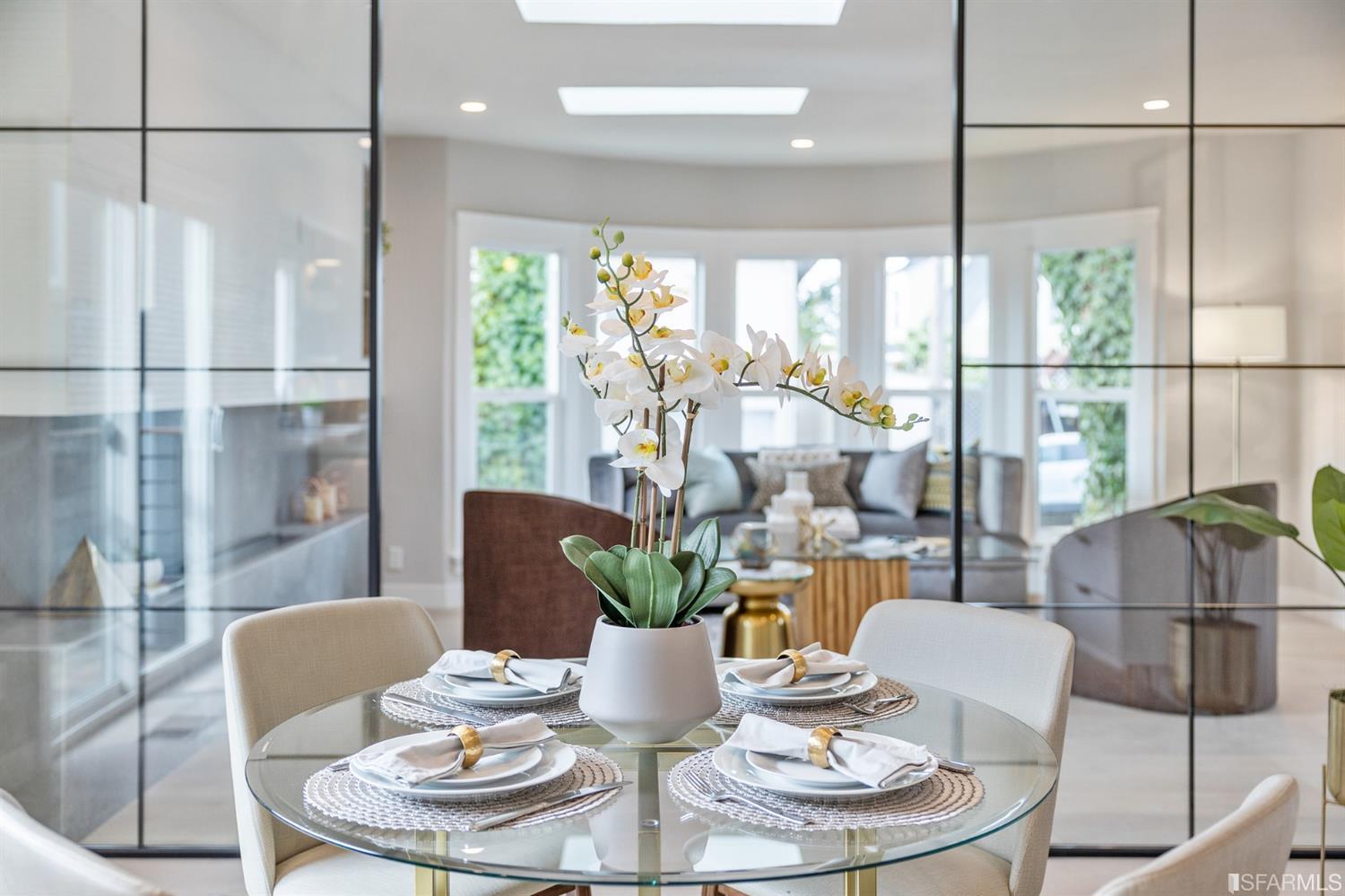 2935 Acton Street Berkeley, CA 94702 - Photo 23 of 63 a dining room with furniture a chandelier and glass door