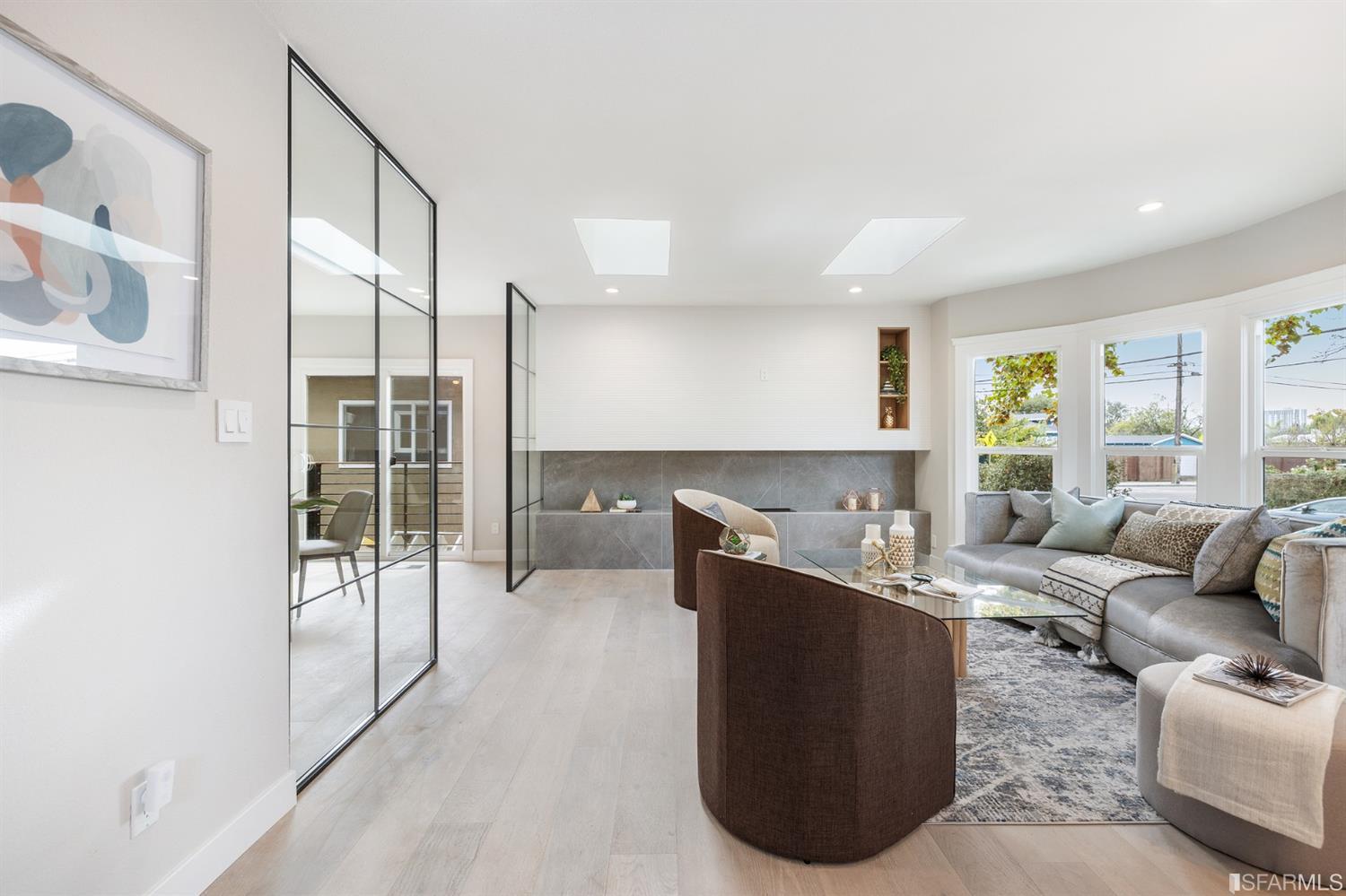 2935 Acton Street Berkeley, CA 94702 - Photo 3 of 63 a living room with furniture and a large window