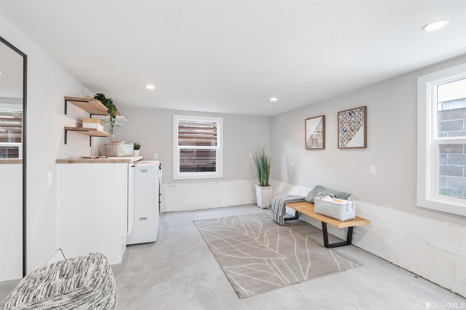 2935 Acton Street Berkeley, CA 94702 - Photo 45 of 63 a living room with furniture and a window