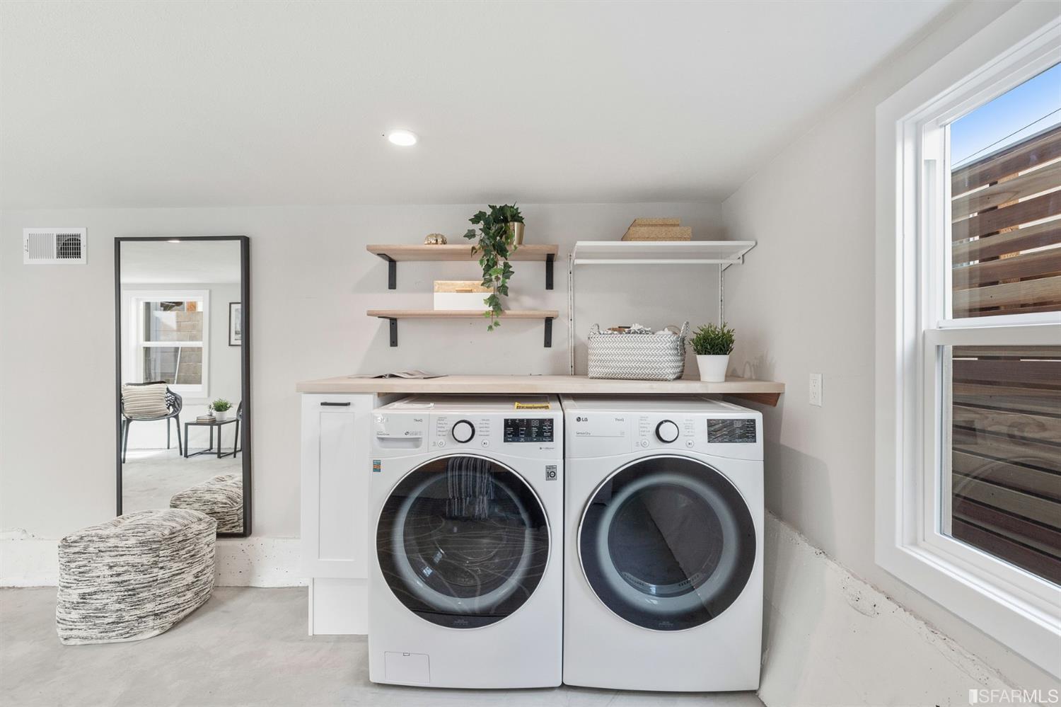 2935 Acton Street Berkeley, CA 94702 - Photo 46 of 63 a utility room with dryer and washer