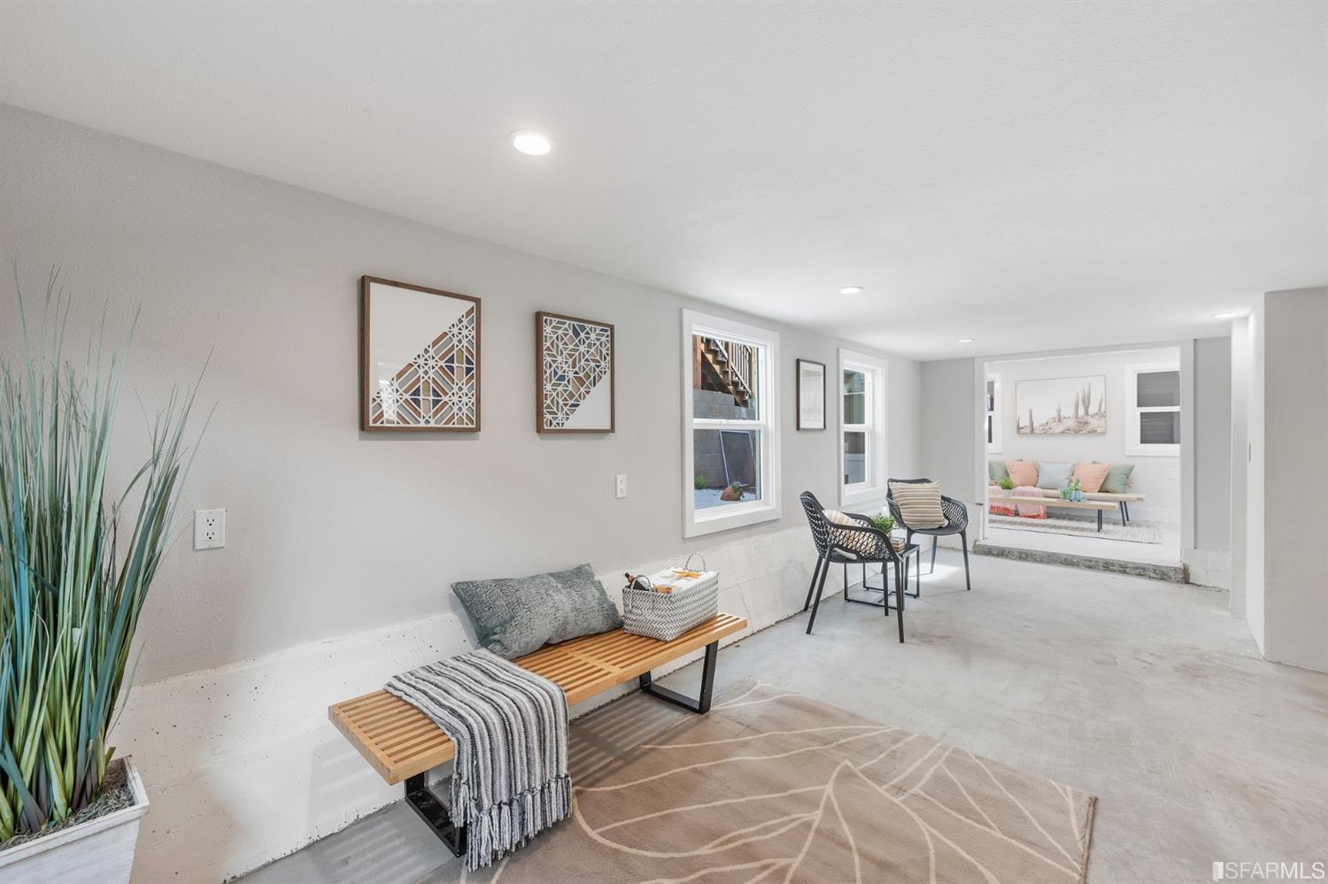 2935 Acton Street Berkeley, CA 94702 - Photo 47 of 63 a living room with furniture and a potted plant