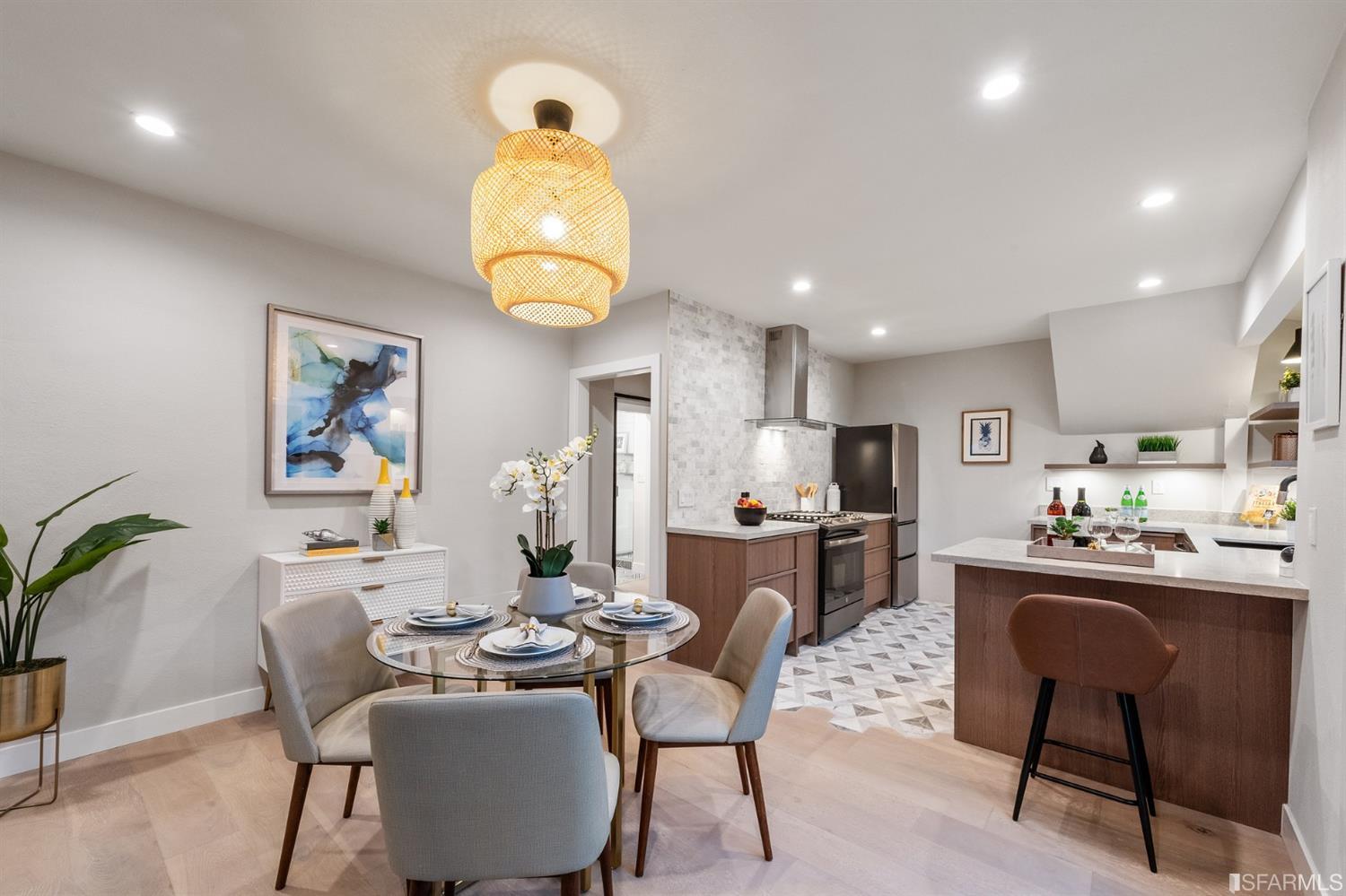 2935 Acton Street Berkeley, CA 94702 - Photo 56 of 63 a dining room with wooden floor and a chandelier