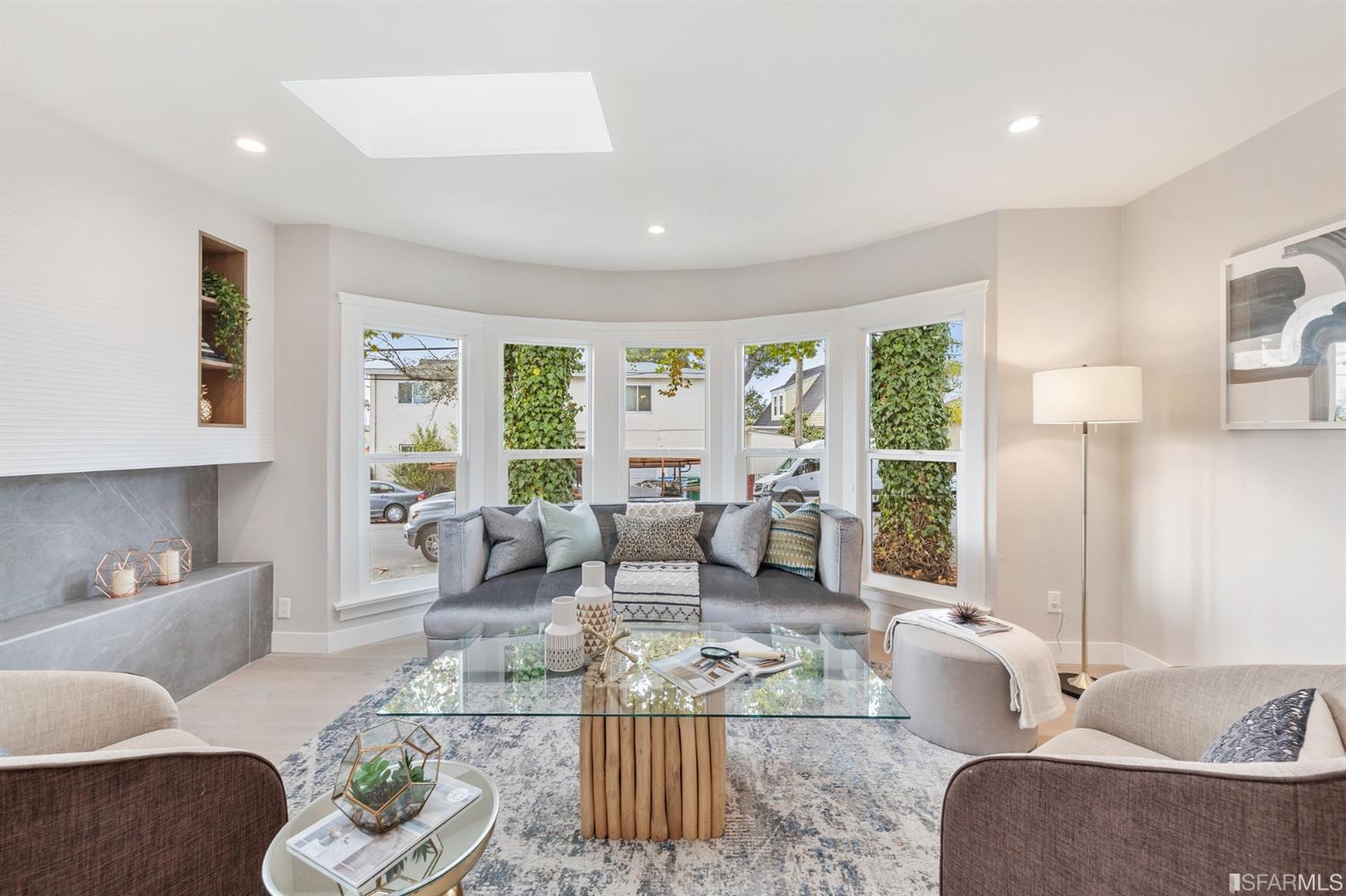 2935 Acton Street Berkeley, CA 94702 - Photo 6 of 63 a living room with furniture and a large window