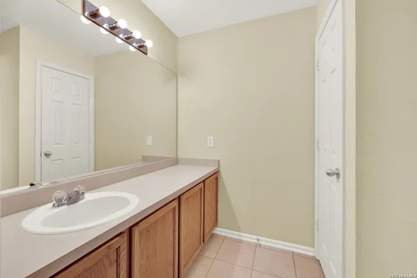 a bathroom with a toilet and a bathtub