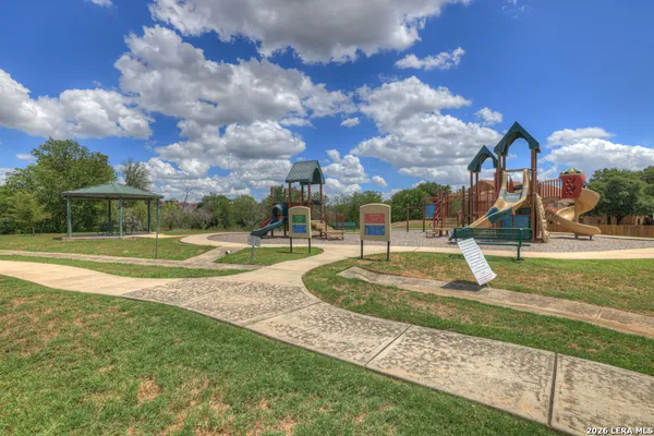 a view of a park with a slide