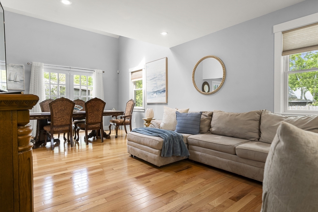 4 Hye Lane Edgartown, MA 02539 - Photo 7 of 41 a living room with furniture dining table and a large window