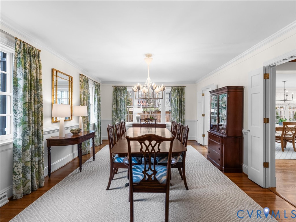 8101 Longwood Road Henrico, VA 23229 - Photo 11 of 49 a view of a dining room with furniture window and wooden floor