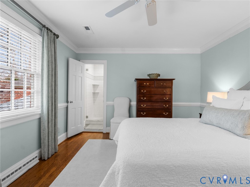 8101 Longwood Road Henrico, VA 23229 - Photo 18 of 49 a bedroom with a bed and a dresser