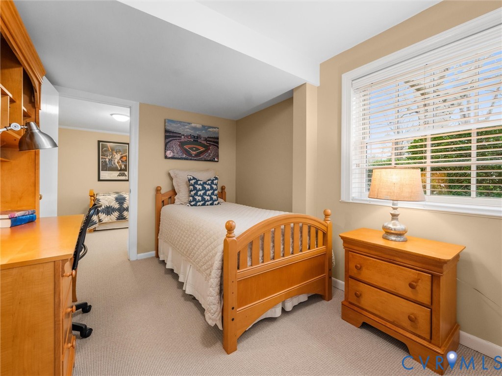 8101 Longwood Road Henrico, VA 23229 - Photo 33 of 49 a bed room with a bed and a window