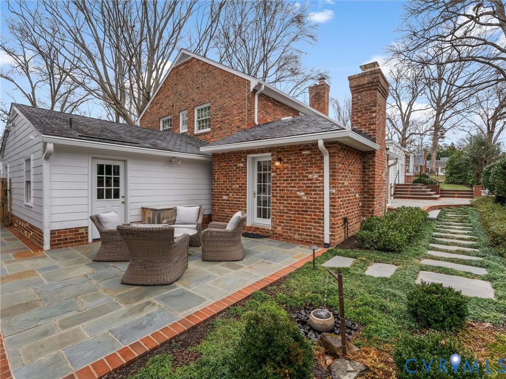 8101 Longwood Road Henrico, VA 23229 - Photo 45 of 49 a view of a house with backyard and sitting area