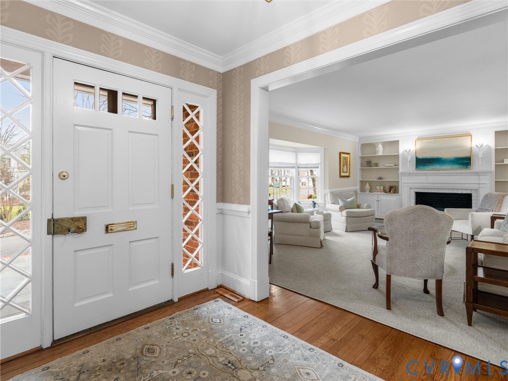 8101 Longwood Road Henrico, VA 23229 - Photo 5 of 49 a living room with furniture and wooden floor