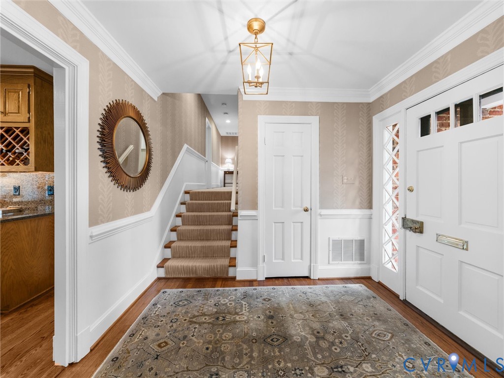 8101 Longwood Road Henrico, VA 23229 - Photo 7 of 49 a view of an entryway with wooden floor