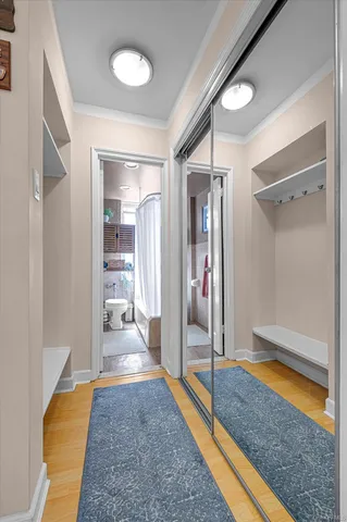 a view of a hallway with a living room