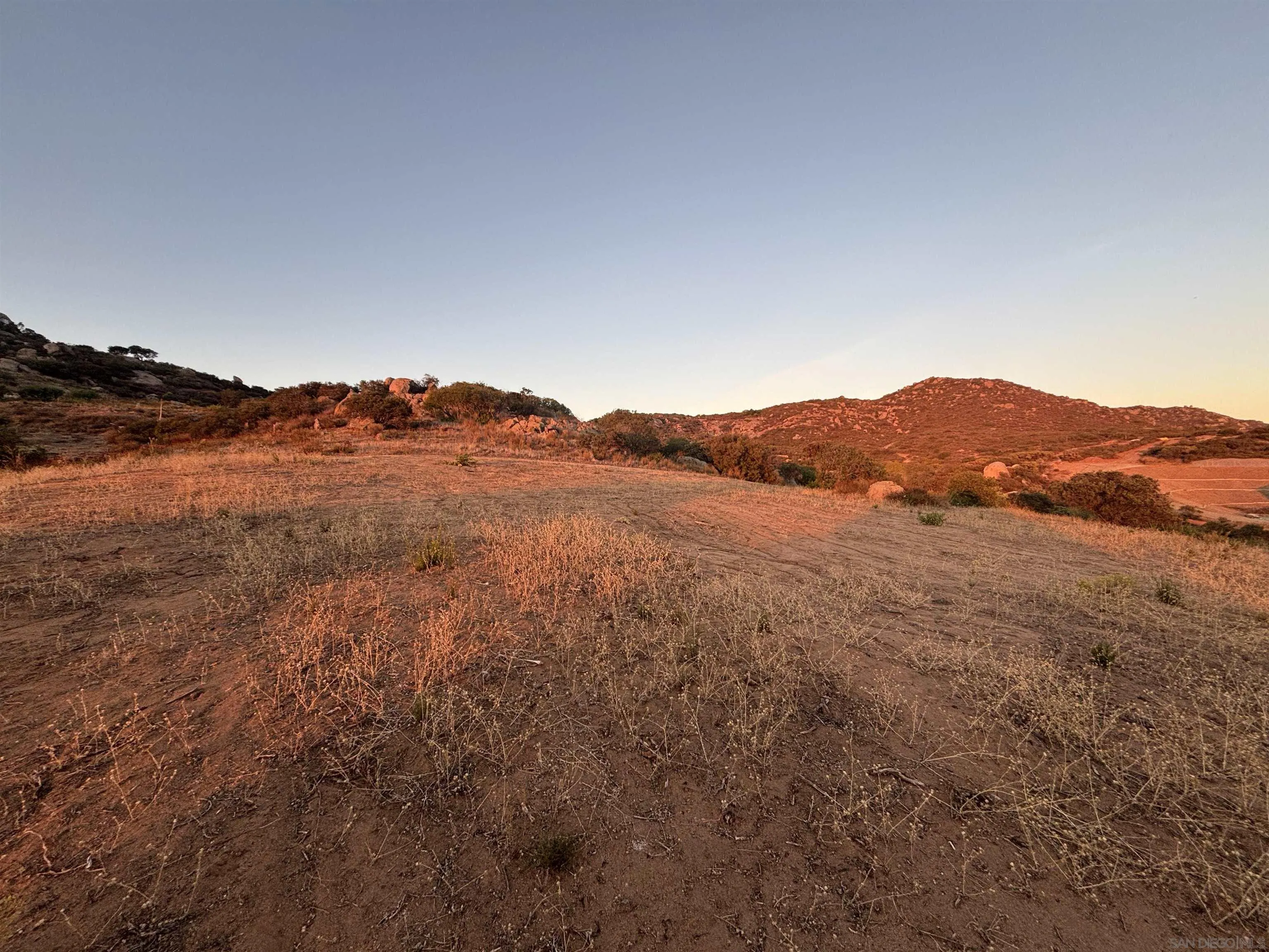 0 Via Dieguenos Alpine, CA 91901 - Photo 8 of 13 a view of a mountain in the distance in a field