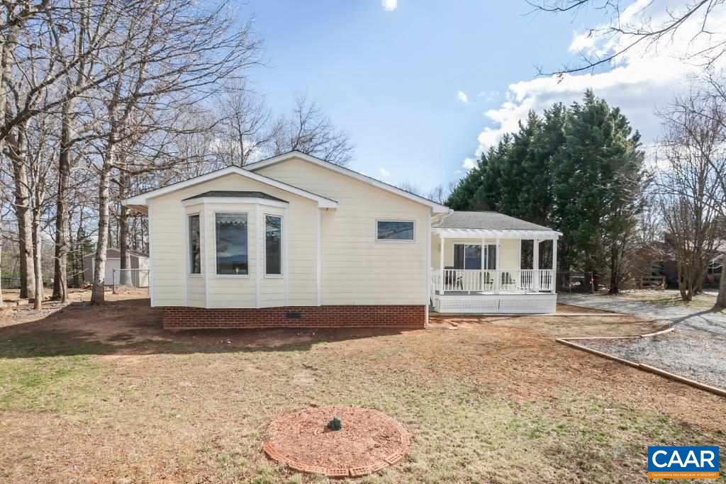 3585 Advance Mills Road Ruckersville, VA 22968 - Photo 1 of 39 a front view of a house with a yard