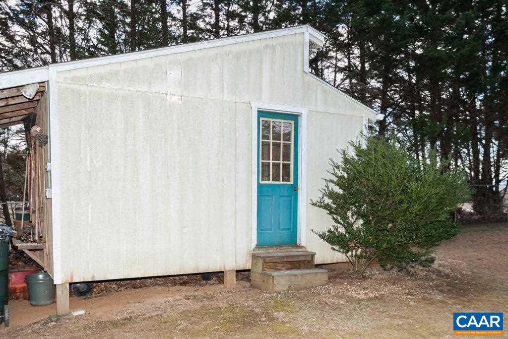 3585 Advance Mills Road Ruckersville, VA 22968 - Photo 14 of 39 a white house with a outdoor space
