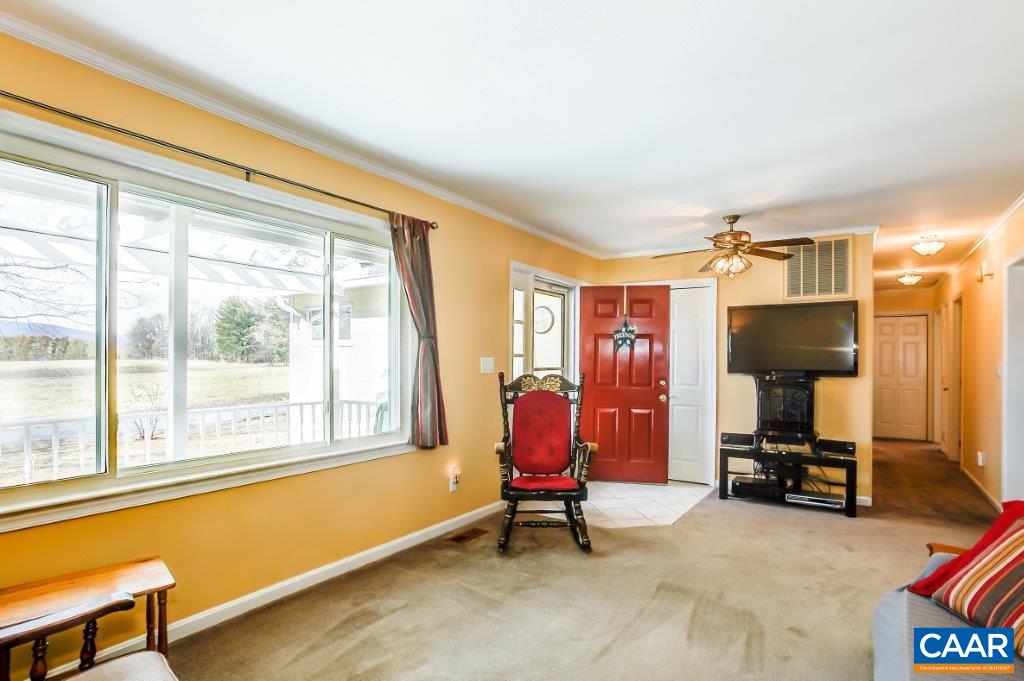 3585 Advance Mills Road Ruckersville, VA 22968 - Photo 18 of 39 a bedroom with furniture and a window