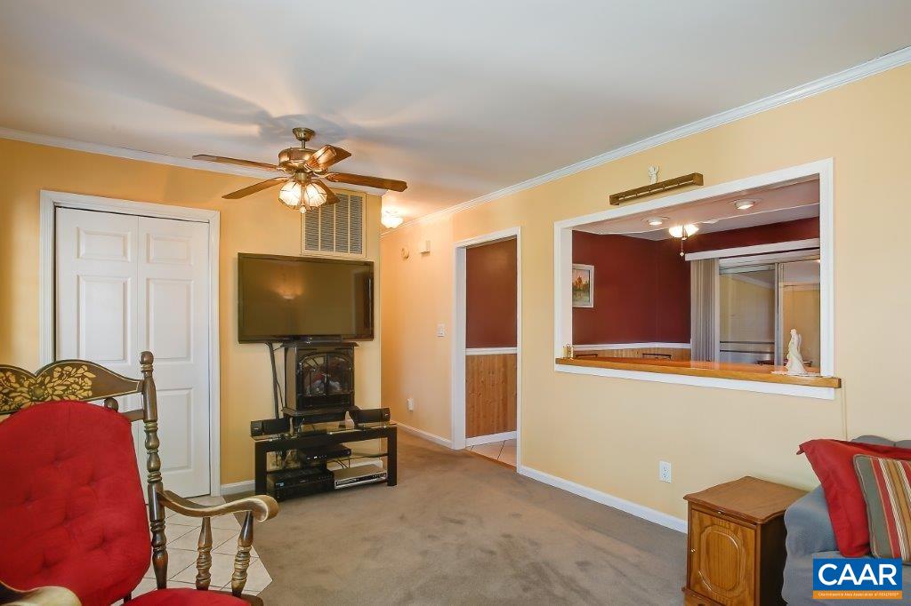 3585 Advance Mills Road Ruckersville, VA 22968 - Photo 20 of 39 a living room with furniture and a flat screen tv