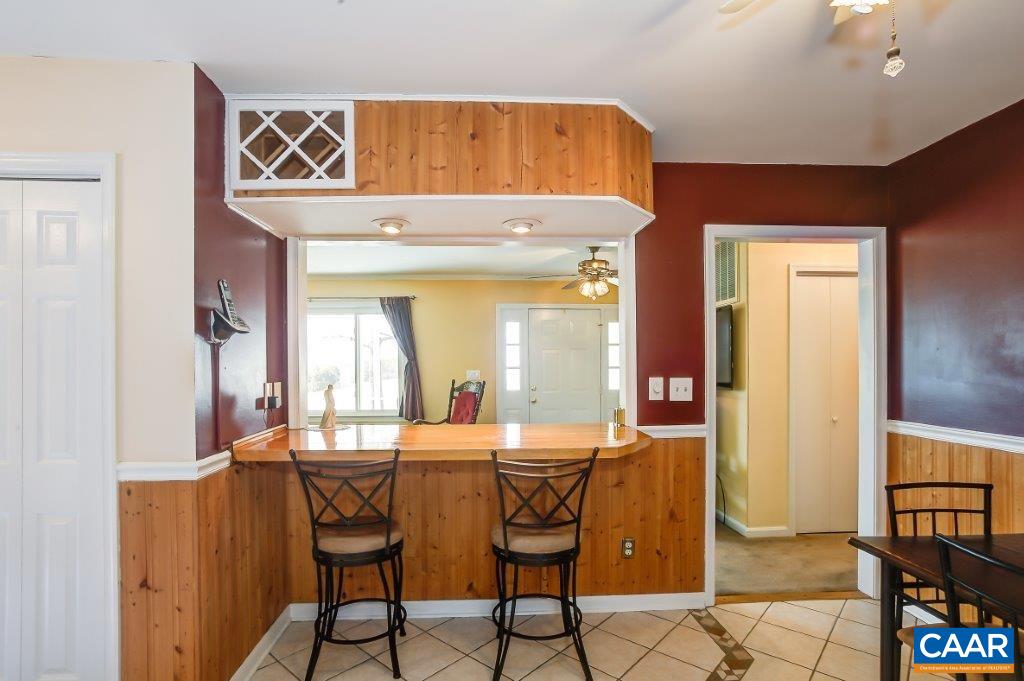 3585 Advance Mills Road Ruckersville, VA 22968 - Photo 21 of 39 a dining room with furniture and window