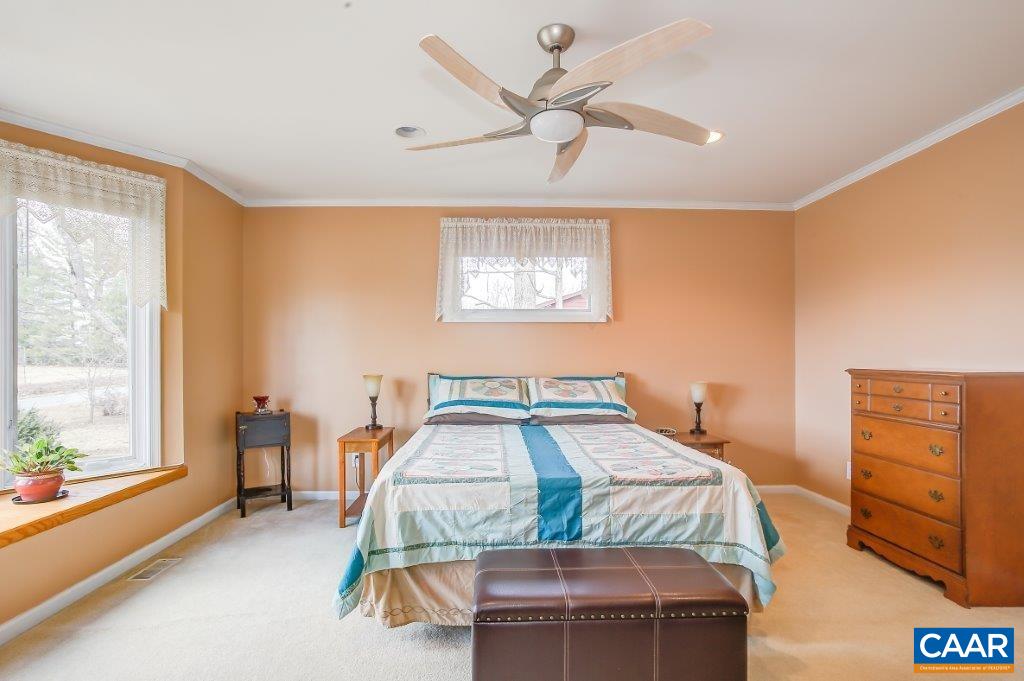 3585 Advance Mills Road Ruckersville, VA 22968 - Photo 30 of 39 a bedroom with a bed and window